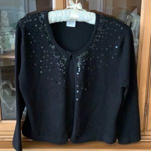 Short black cardigan with black sequins on the front. Size m